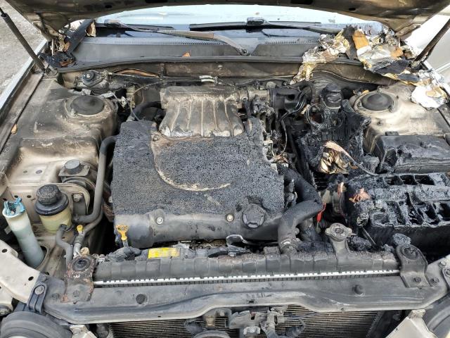 Photo 11 from auction – 2004 KIA OPTIMA LX with VIN KNAGD128545329343