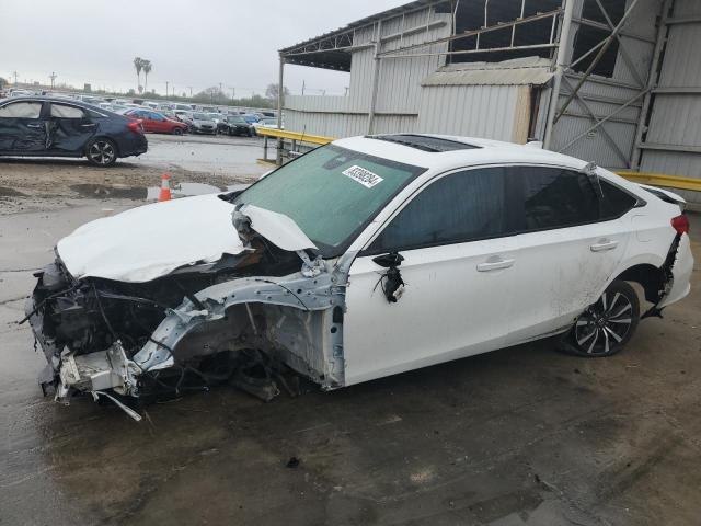 Photo 1 from auction – 2022 HONDA CIVIC EX with VIN JHMFE1F75NX000210