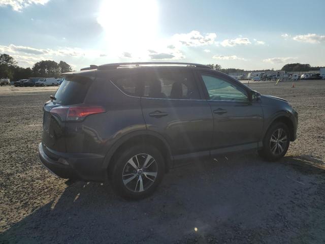 Photo 3 from auction – 2017 TOYOTA RAV4 XLE with VIN 2T3WFREV4HW342155