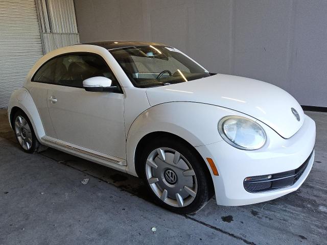 Photo 4 from auction – 2012 VOLKSWAGEN BEETLE with VIN 3VWHP7AT5CM638470