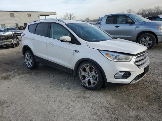 Photo 4 from auction – 2017 FORD ESCAPE TIT with VIN 1FMCU9J90HUD11043