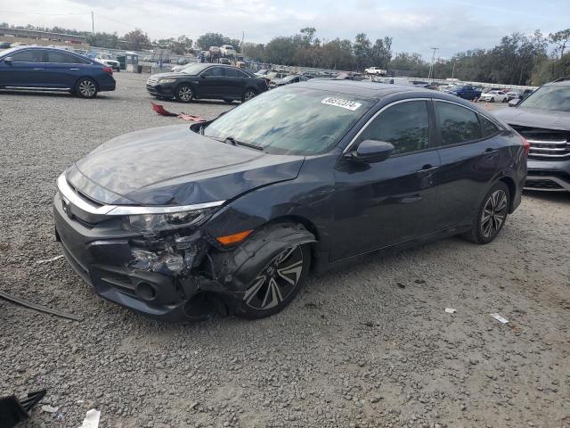 HONDA CIVIC EXL 2017 with VIN 19XFC1F75HE028357 - Photo from auction
