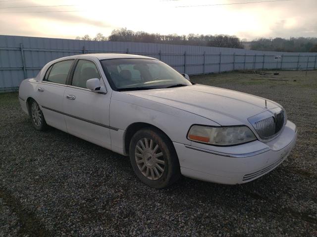 Photo 4 from auction – 2003 LINCOLN TOWN CAR E with VIN 1LNHM81W33Y664125