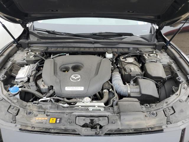 Photo 11 from auction – 2023 MAZDA CX-50 PREM with VIN 7MMVABDY7PN115058