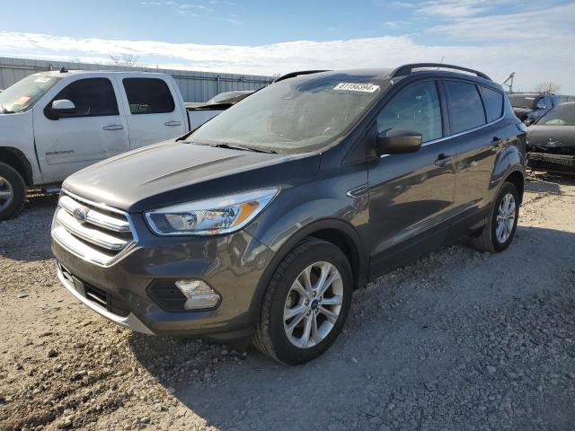 FORD ESCAPE SE 2018 with VIN 1FMCU0GD9JUD07649 - Photo from auction