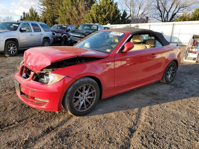 BMW 128 I 2010 with VIN WBAUL7C54AVJ77712 - Photo from auction