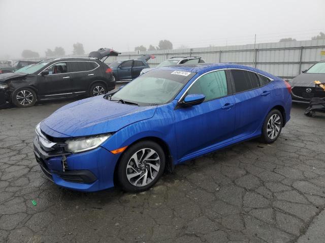 HONDA CIVIC EX 2018 with VIN 2HGFC2F75JH507198 - Photo from auction