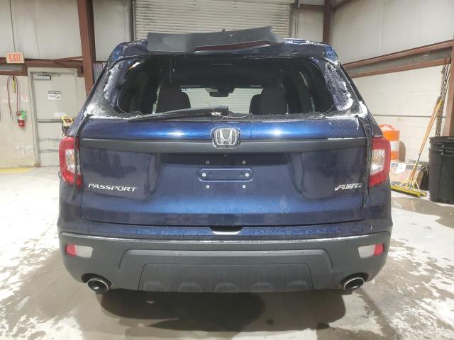 Photo 6 from auction – 2021 HONDA PASSPORT E with VIN 5FNYF8H59MB043548