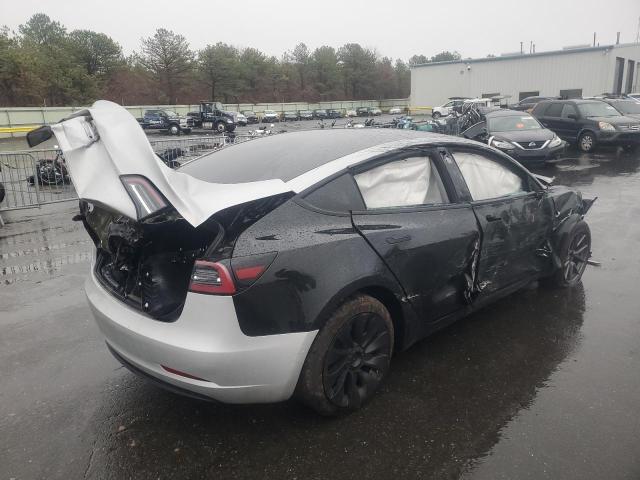 Photo 3 from auction – 2022 TESLA MODEL 3 with VIN 5YJ3E1EB6NF333326