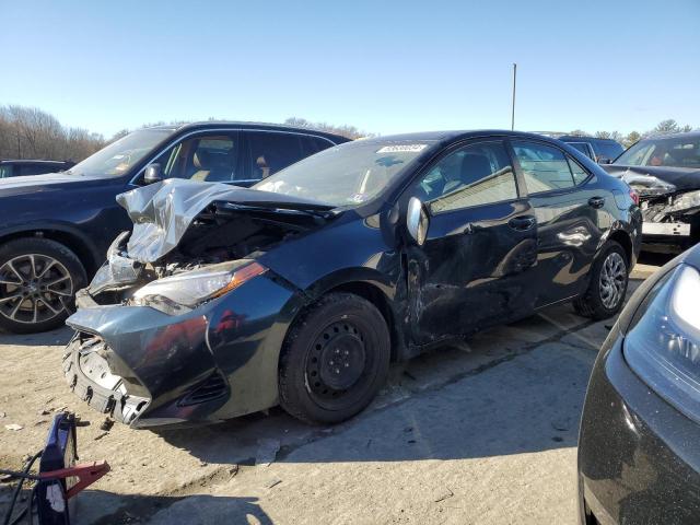 TOYOTA COROLLA L 2017 with VIN 2T1BURHE7HC803052 - Photo from auction