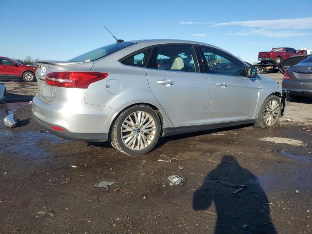 Photo 3 from auction – 2015 FORD FOCUS TITA with VIN 1FADP3J24FL216008