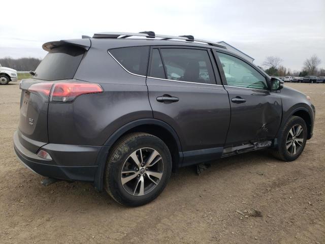 Photo 3 from auction – 2017 TOYOTA RAV4 XLE with VIN 2T3RFREV2HW627398