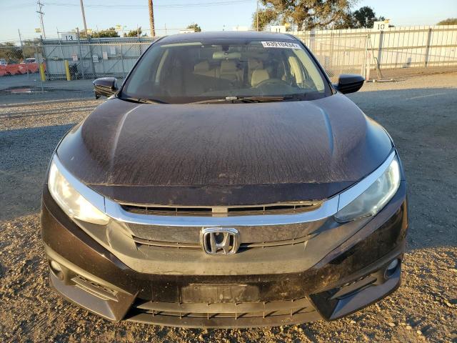 Photo 5 from auction – 2016 HONDA CIVIC EX with VIN 19XFC1F38GE040451