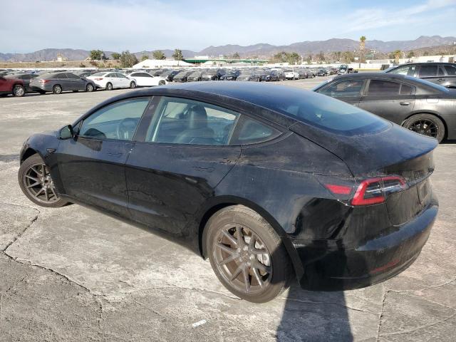 Снимка 2 от търг – 2022 TESLA MODEL 3 с VIN 5YJ3E1EAXNF374713