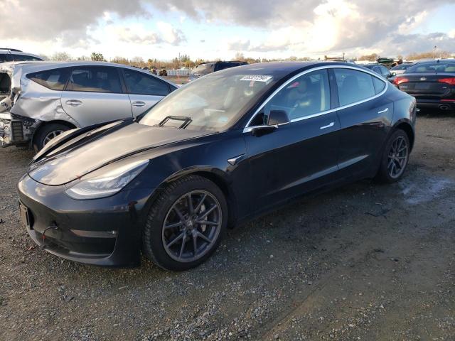 TESLA MODEL 3 2018 with VIN 5YJ3E1EA0JF052060 - Photo from auction
