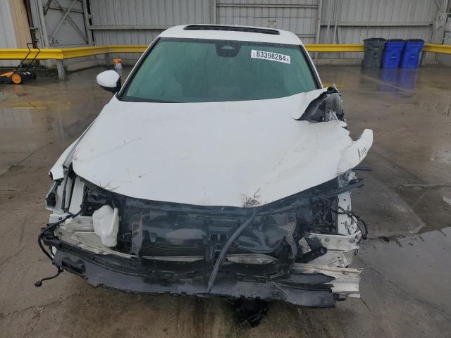 Photo 5 from auction – 2022 HONDA CIVIC EX with VIN JHMFE1F75NX000210