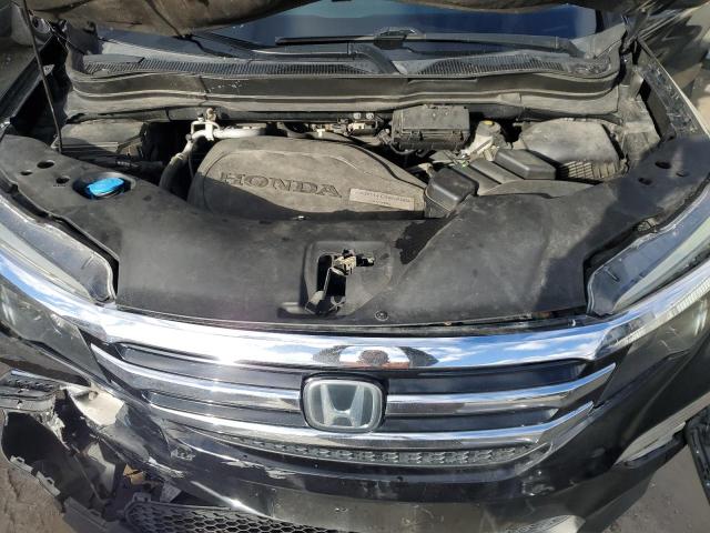 Photo 12 from auction – 2016 HONDA PILOT ELIT with VIN 5FNYF6H09GB090382