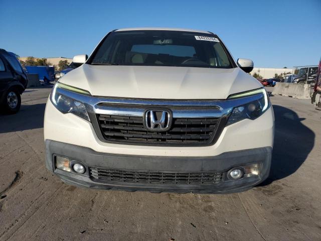 Photo 5 from auction – 2017 HONDA RIDGELINE with VIN 5FPYK3F65HB030514