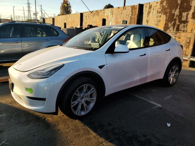 TESLA MODEL Y 2023 with VIN 7SAYGDEE7PA104684 - Photo from auction
