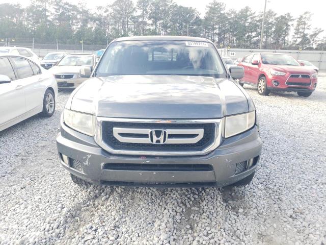 Photo 5 from auction – 2011 HONDA RIDGELINE with VIN 5FPYK1F46BB001193