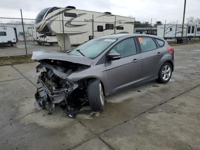 FORD FOCUS SE 2014 with VIN 1FADP3K20EL350527 - Photo from auction