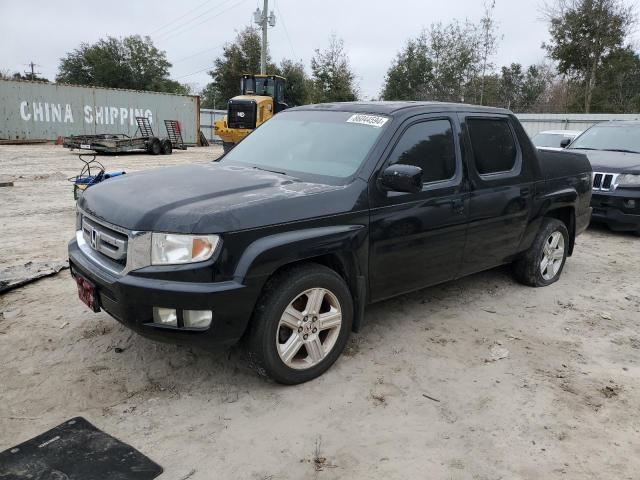 HONDA RIDGELINE 2011 with VIN 5FPYK1F51BB005399 - Photo from auction