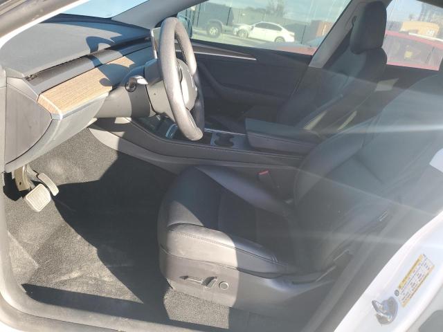 Photo 7 from auction – 2022 TESLA MODEL Y with VIN 7SAYGAEE2NF548618