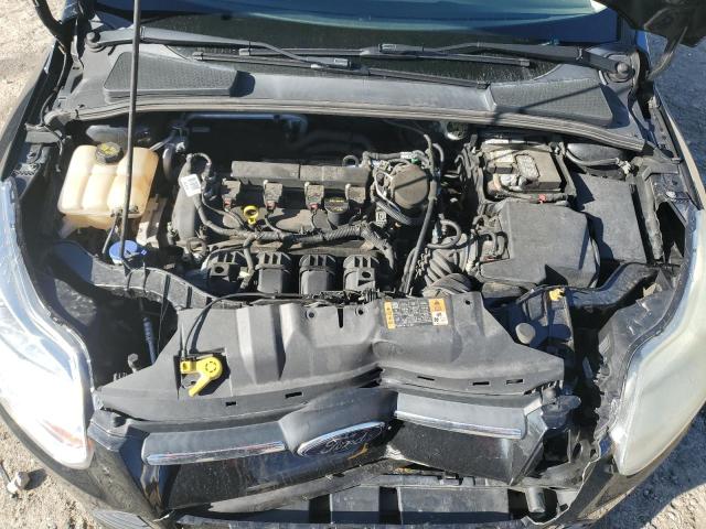 Photo 11 from auction – 2014 FORD FOCUS S with VIN 1FADP3E21EL316219