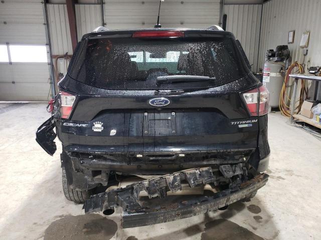 Photo 6 from auction – 2017 FORD ESCAPE TIT with VIN 1FMCU9J98HUF09384