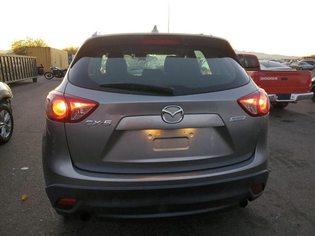 Photo 6 from auction – 2014 MAZDA CX-5 SPORT with VIN JM3KE2BE1E0410383