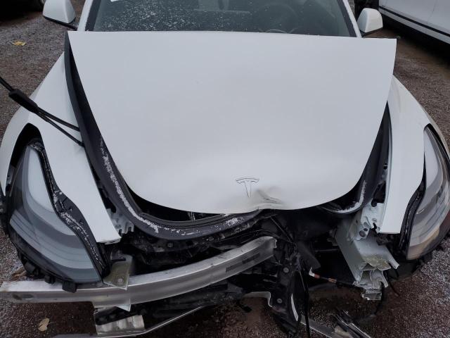 Photo 11 from auction – 2022 TESLA MODEL 3 with VIN 5YJ3E1EC2NF343103