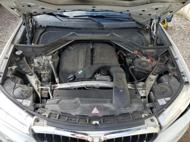 Photo 11 from auction – 2014 BMW X5 SDRIVE3 with VIN 5UXKR2C50E0H34356