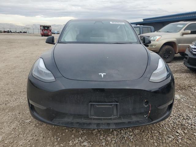 Photo 5 from auction – 2023 TESLA MODEL Y with VIN 7SAYGAEE8PF772964