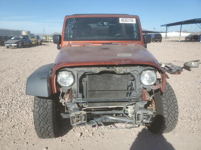 Photo 5 from auction – 2014 JEEP WRANGLER U with VIN 1C4BJWDG8EL250897