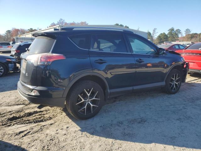 Photo 3 from auction – 2017 TOYOTA RAV4 SE with VIN JTMJFREV7HJ156747