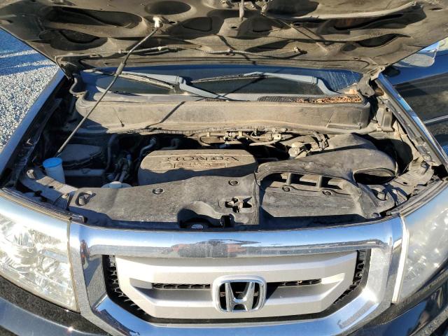 Photo 12 from auction – 2011 HONDA PILOT TOUR with VIN 5FNYF3H9XBB041181