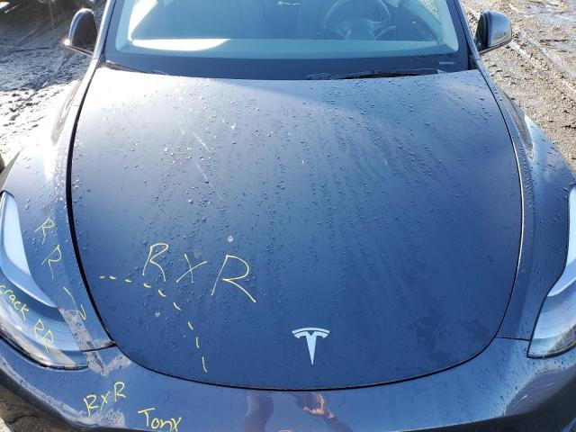 Photo 11 from auction – 2024 TESLA MODEL Y with VIN 7SAYGDEDXRF019013