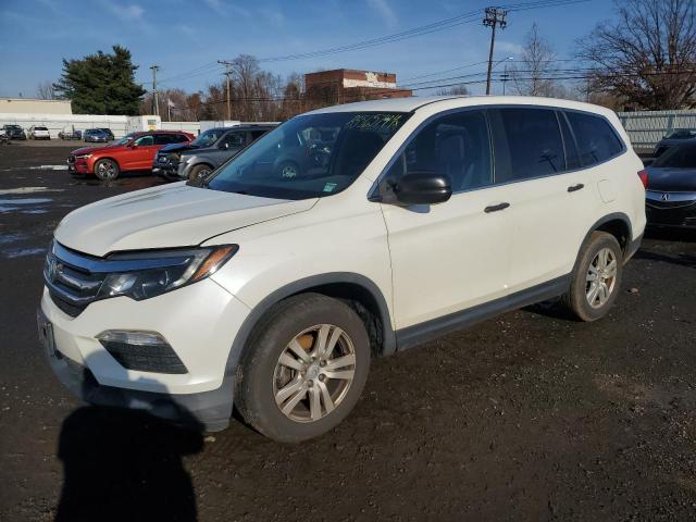 HONDA PILOT LX 2017 with VIN 5FNYF6H15HB005693 - Photo from auction
