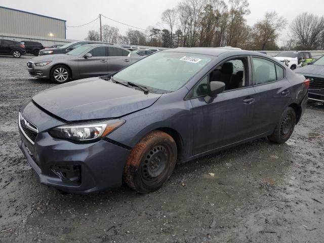 SUBARU IMPREZA 2017 with VIN 4S3GKAA61H3615796 - Photo from auction