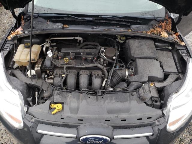 Photo 11 from auction – 2014 FORD FOCUS SE with VIN 1FADP3F27EL323951