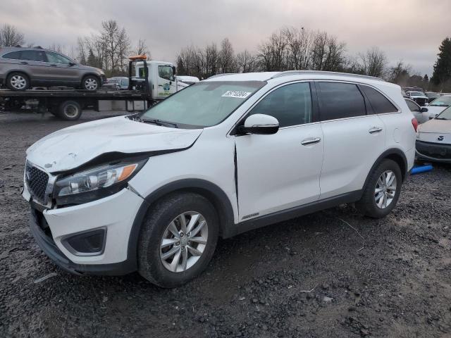 KIA SORENTO LX 2016 with VIN 5XYPGDA58GG110990 - Photo from auction