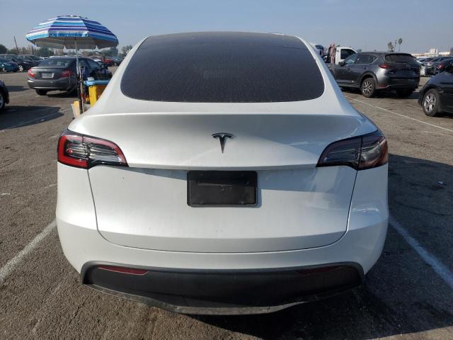 Снимка 6 от търг – 2023 TESLA MODEL Y с VIN 7SAYGDED7PF957340