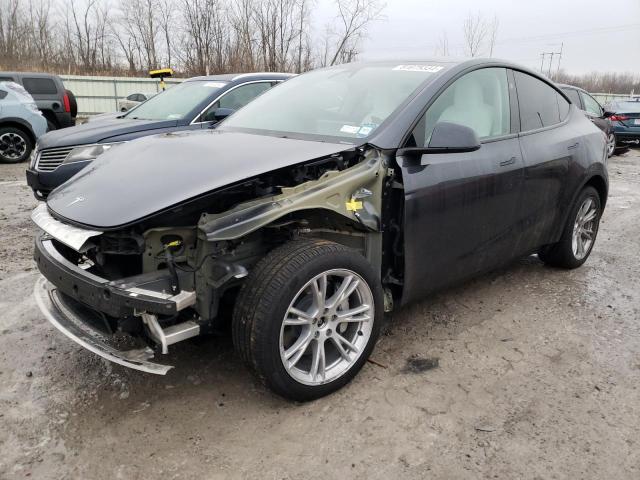 TESLA MODEL Y 2024 with VIN 7SAYGDEE0RA245714 - Photo from auction