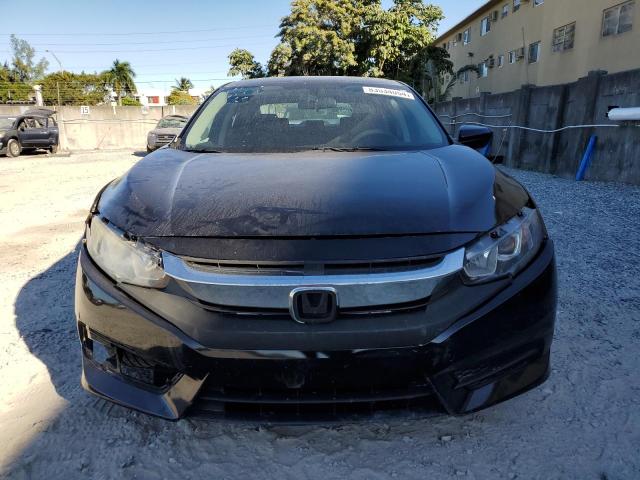 Photo 5 from auction – 2017 HONDA CIVIC EX with VIN 19XFC2F79HE057141