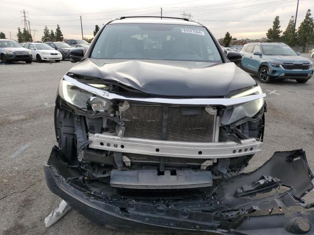 Photo 5 from auction – 2016 HONDA PILOT EX with VIN 5FNYF5H39GB011314