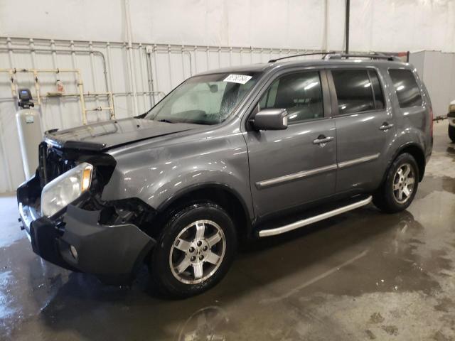 HONDA PILOT TOUR 2010 with VIN 5FNYF4H85AB034036 - Photo from auction