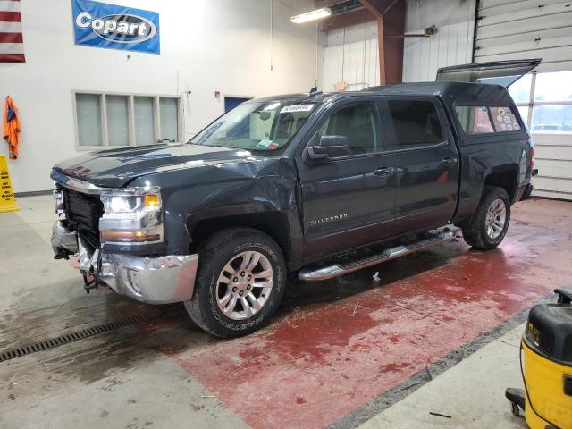 CHEVROLET SILVERADO 2018 with VIN 3GCUKREC6JG214345 - Photo from auction