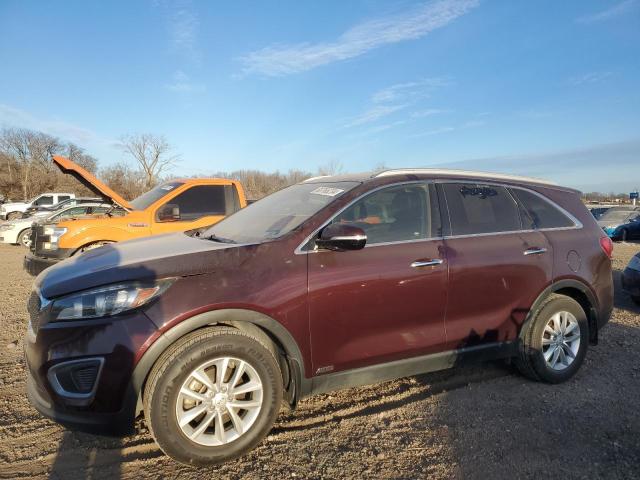 KIA SORENTO LX 2016 with VIN 5XYPGDA34GG142236 - Photo from auction