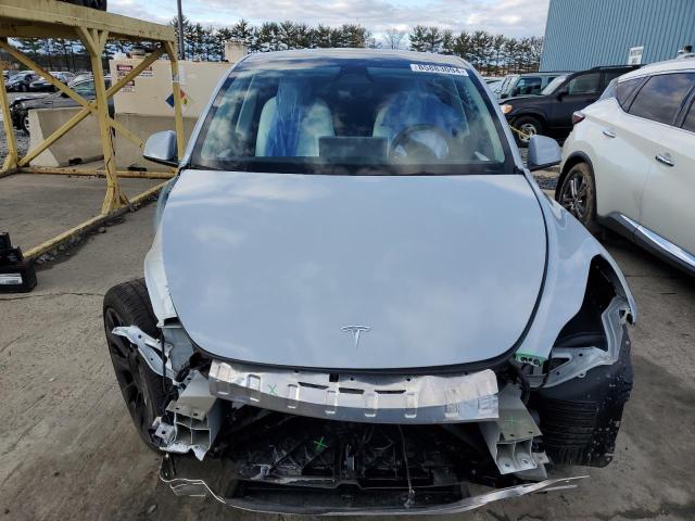 Photo 5 from auction – 2023 TESLA MODEL Y with VIN 7SAYGAEE5PF956954