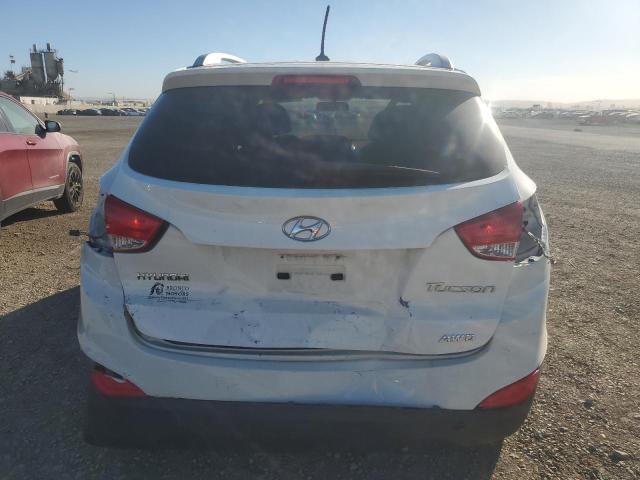 Photo 6 from auction – 2012 HYUNDAI TUCSON GLS with VIN KM8JUCAC2CU350810
